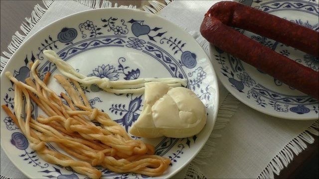 Assortment of cheeses on plate
