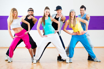 Dancer at Zumba fitness training in dance studio