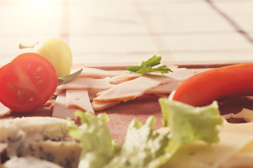 Delicious Meat And Cheese Slices With Tomatoes