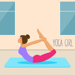 beautiful young girl practicing yoga in the gym