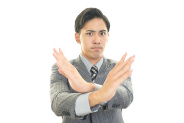 禁止の意思表示をする男性