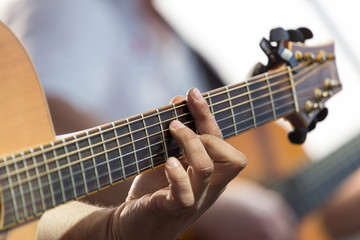 Fototapeta na wymiar playing guitar on stage