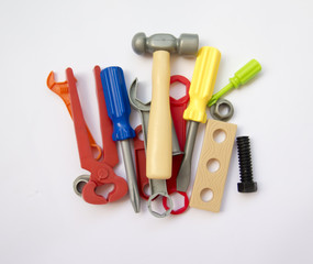 A lot of children's toy instruments gathered in a pile, bright c