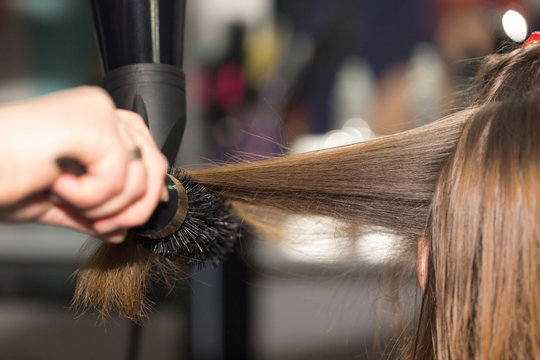 Styling Hair Dryer In A Beauty Salon