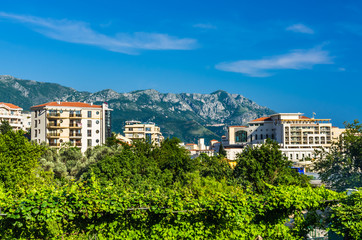 View on hotels and mountains in Becici