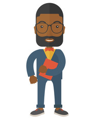 Man holding book under his arm.