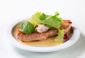 Fried pork belly with leaf vegetables