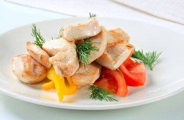 Chicken breast pieces with vegetables