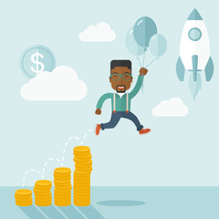 African businessman holding balloons.