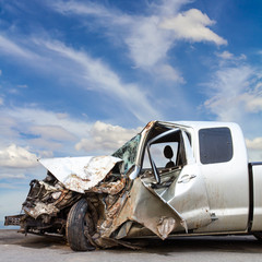 car demolished Cloudy sky