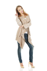 Happy casual woman standing.