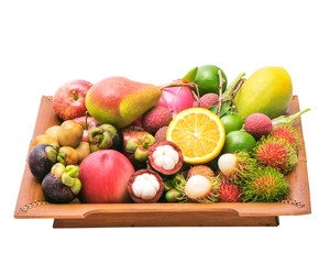 Group fruits on bamboo plate , isolated with clipping path