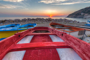 colorful boats at sunset