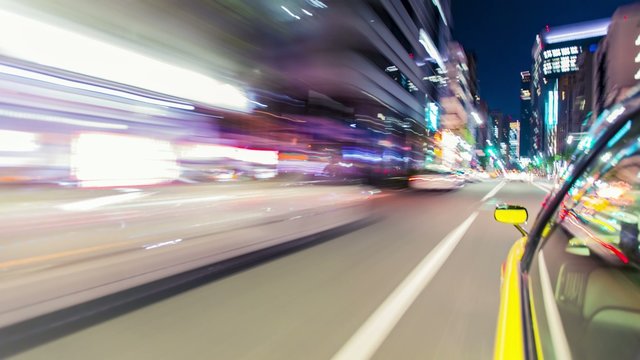 Point of view timelapse (hyperlapse)  through the city at night by car. Tokyo, Japan