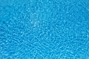 Blue water surface in swimming pool