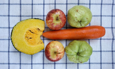 fruits and vegetable on plaid fabric