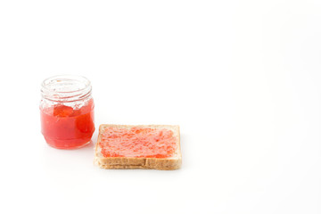 whole wheat bread with strawberry jam