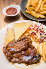 beefsteak with french fries and bread