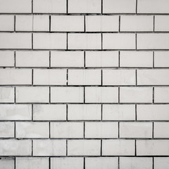 white brick wall background and textute.