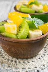 Fruit salad with kiwi, banana and orange