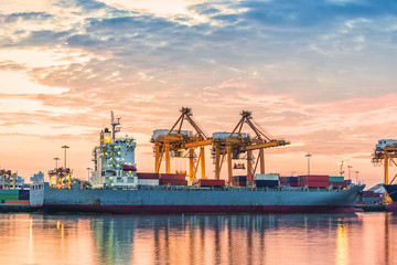 Container loading in a Cargo freight ship with industrial crane. Container ship in import and...