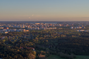 Fototapeta na wymiar Sunset over Tallinn city residential area, aerial view