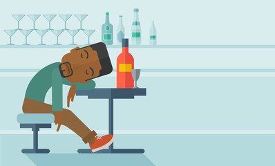 African Drunk man fall asleep in the pub.