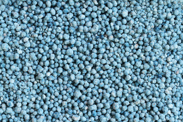 Blue fertilizer texture background