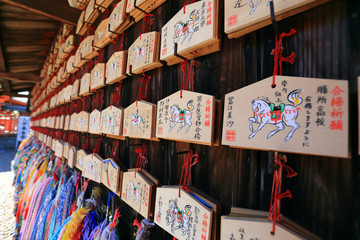 Origami cranes and prayer tablets at Fushimi