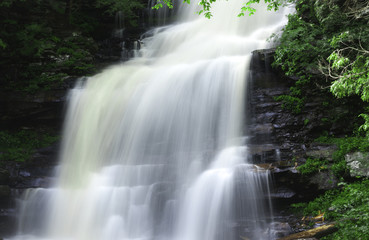 Fototapeta na wymiar Waterfall Over The Mountain