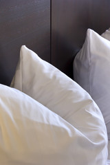 Fototapeta na wymiar Pillows at the Bed