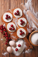 preparation of ingredients for dumplings with cherries
