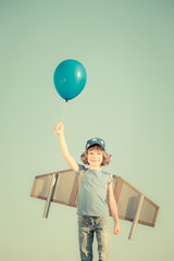 Happy child playing outdoors