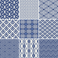 Geometric seamless ethnic background collection in blue and white