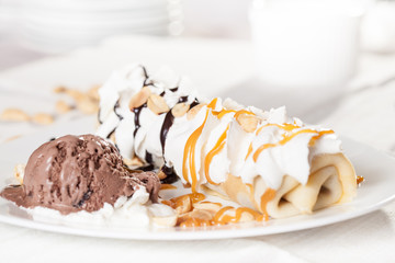 Pancake with chocolate ice cream and peanut 
