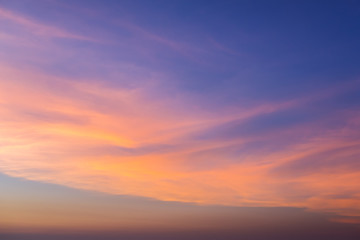 Fototapeta na wymiar Sunset sky with orange colored clouds. 