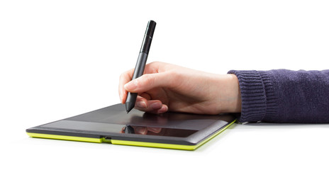 isolated womans hand draws a pen on a touch tablet