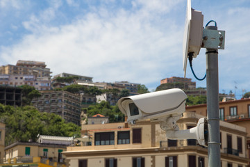 Fototapeta na wymiar CCTV security camera in a big capital city