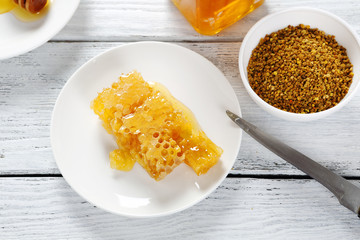 Honeycomb with honey on a plate