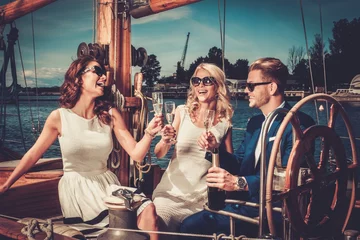 Foto op Plexiglas Stylish wealthy friends having fun on a luxury yacht © Nejron Photo