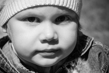 Closeup monochrome portrait of small girl
