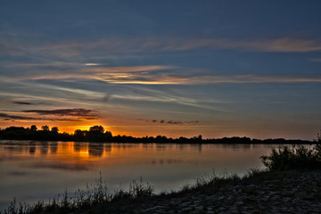 Fototapeta na wymiar Vistula river and dramatic sky.