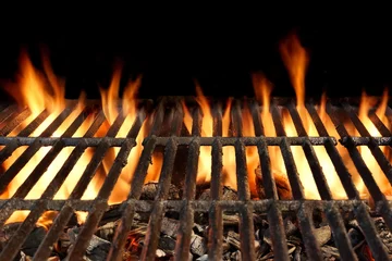 Foto op Plexiglas BBQ Grill With Flaming Charcoal Isolated On Black Background © Alex