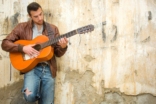 man with guitar. urban style