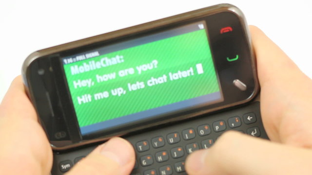 Mobile Chat Messages - smartphone with qwerty keypad and touchscreen) used for online chat, generic "Hello" type message appears on the screen