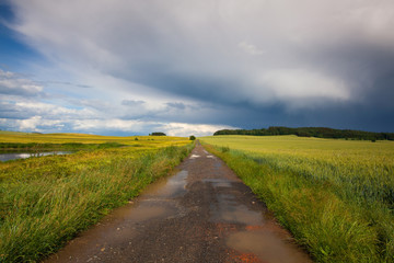 Empty road and landscape after heavy storm