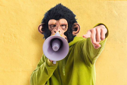Monkey man shouting by megaphone