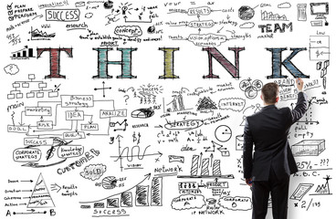 businessman drawing think
