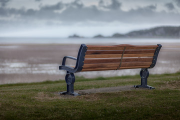 A remembrance bench at Mumbles road on the Swansea coast