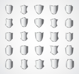 Silver shield design set with various shapes.